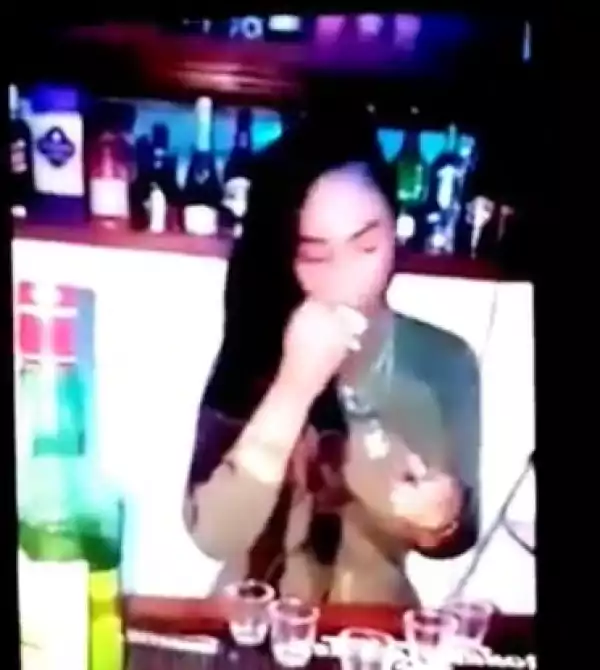 Ghanaian Bar Owner Caught On Camera Cleaning Glasses With Her Saliva (Photo, Video)